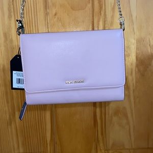 beautiful pink and gold crossbody bag. great for everyday new with tags!